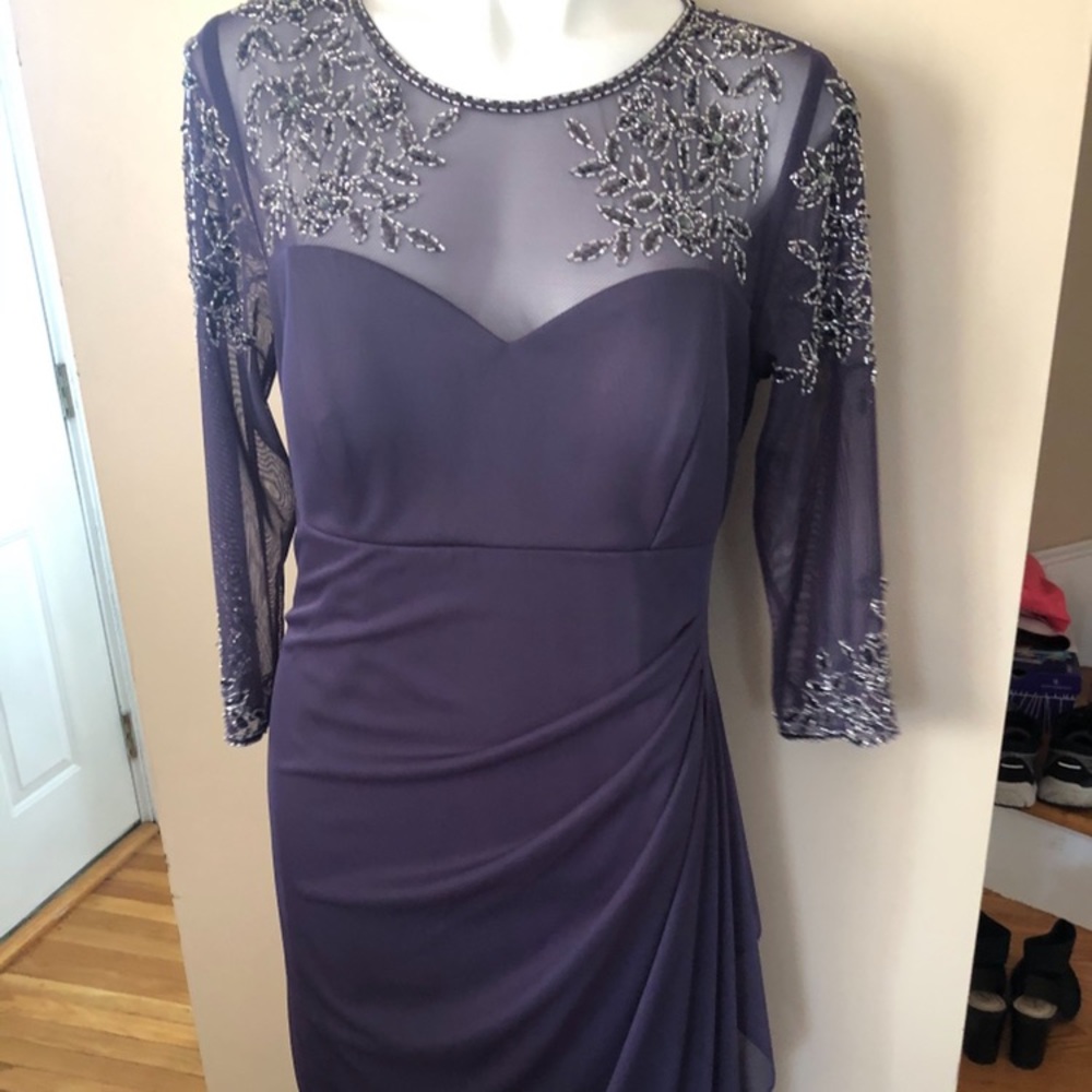 Size 12 gown. Perfect condition.